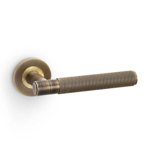 Alexander & Wilks AW222AB, Reeded Spitfire Lever Handle in Antique Brass.